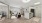 Open concept living room and kitchen with large entryway