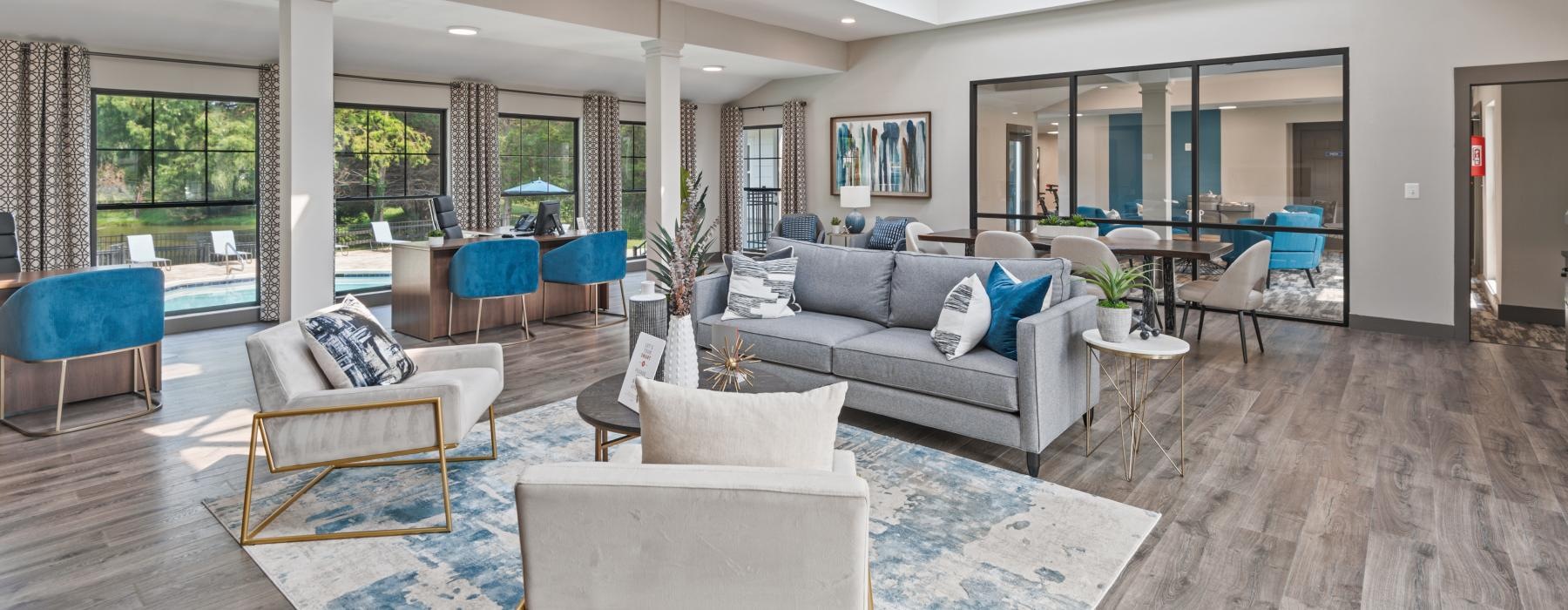 a living room with a large glass door and a large window