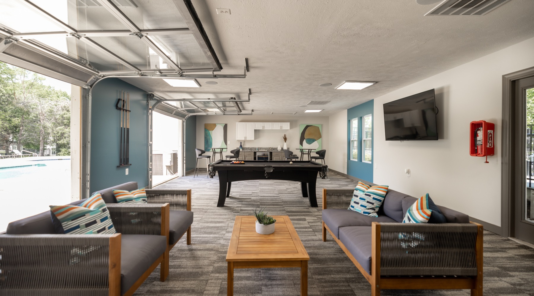 Clubroom with plush seating and billiards table