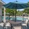 a patio with a table and chairs