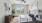 a bedroom with a bed and a fan